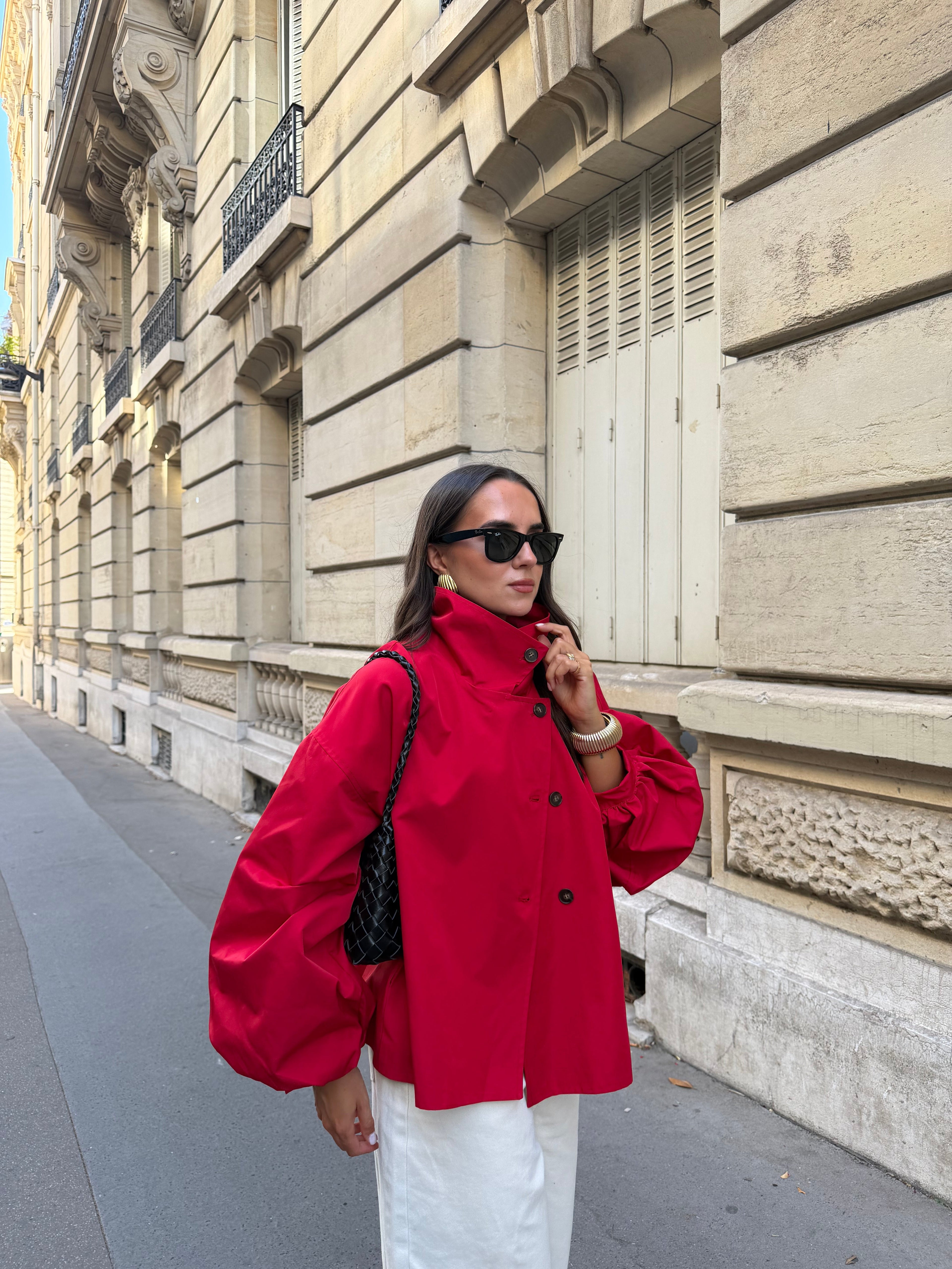 Women's red parka jacket with stand collar and button front