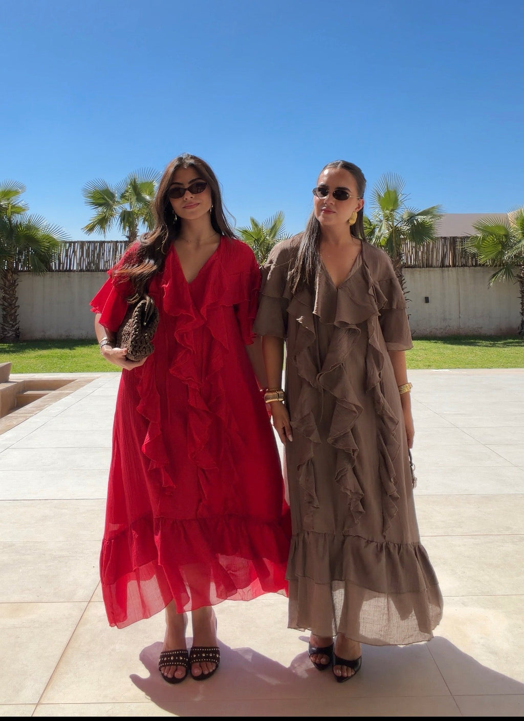 Women's red V-neck midi dress with short flutter sleeves and layered ruffles