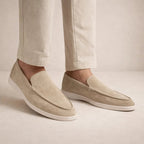 Men's textured slip-on loafers with stitched almond toes and flat soles