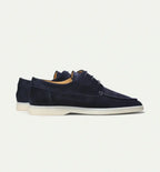 Men's lace-up moccasin shoes with rounded stitched toe and flat light sole