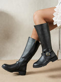 Women's knee high boots with side zips and buckle straps