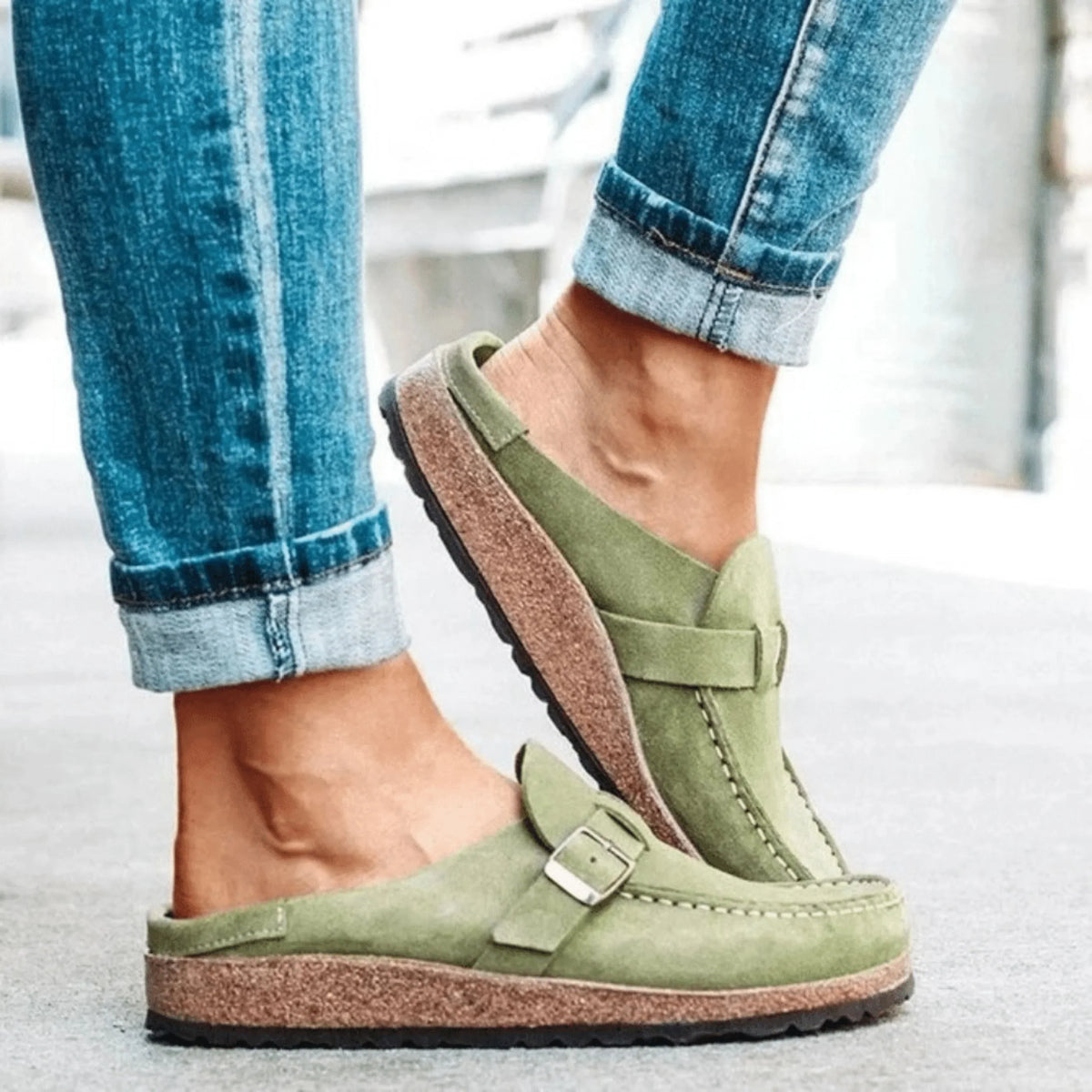 Women's moc toe loafers with buckle straps and flat textured soles