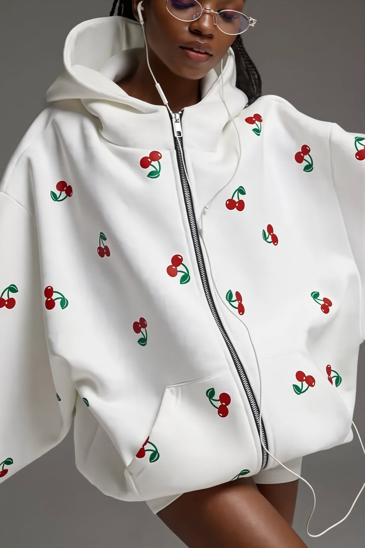 Women's oversized zip hoodie with scattered cherry print and front kangaroo pocket