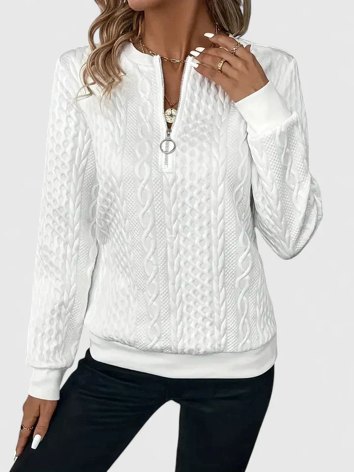 Women's textured cable knit quarter-zip sweater with long sleeves and ribbed trims