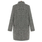 Women's long black and white herringbone coat with notched collar and button fastening
