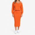Women's two-piece midi dress set with long-sleeve V-neck jumper and fitted ribbed dress