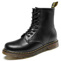 Women's lace-up ankle boots with round toe, flat ridged sole and back pull tab