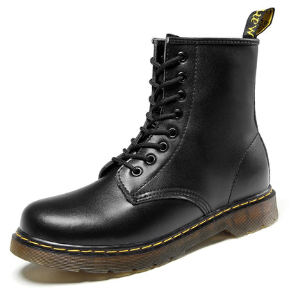 Women's lace-up ankle boots with round toe, flat ridged sole and back pull tab
