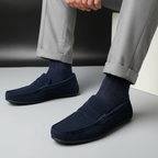Men's slip-on loafers with rounded moc toes and penny strap detail