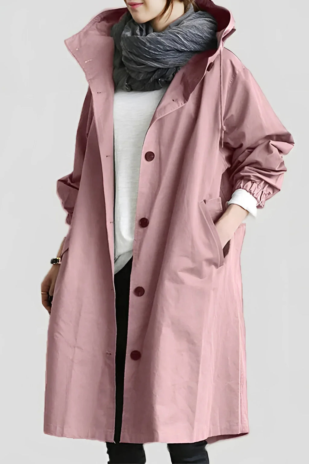 Women's long hooded trench coat with button front and gathered sleeves
