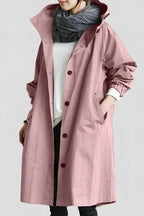 Women's long hooded trench coat with button front and gathered sleeves