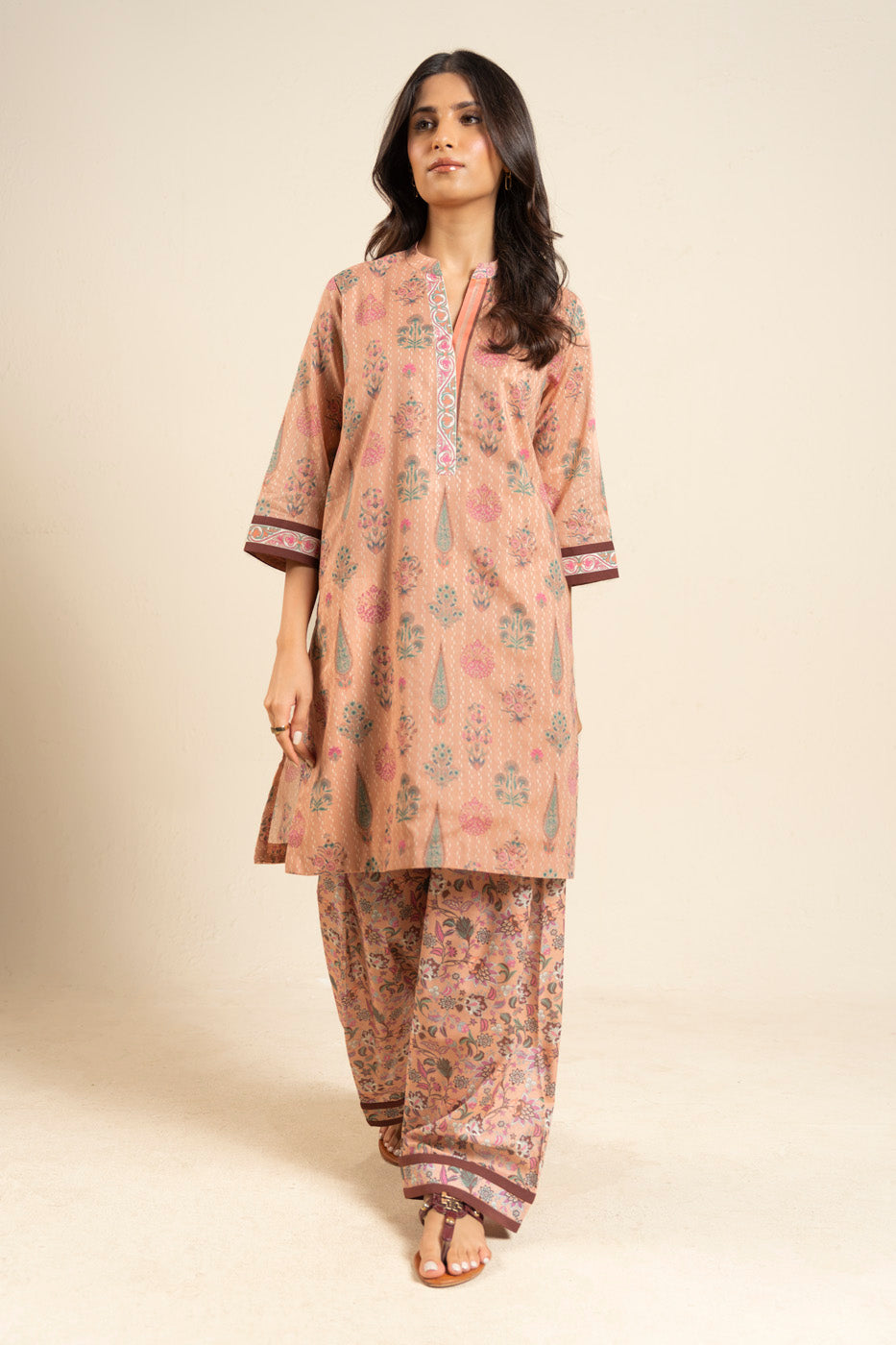 Women's peach floral shirt and wide-leg trouser set with mandarin collar