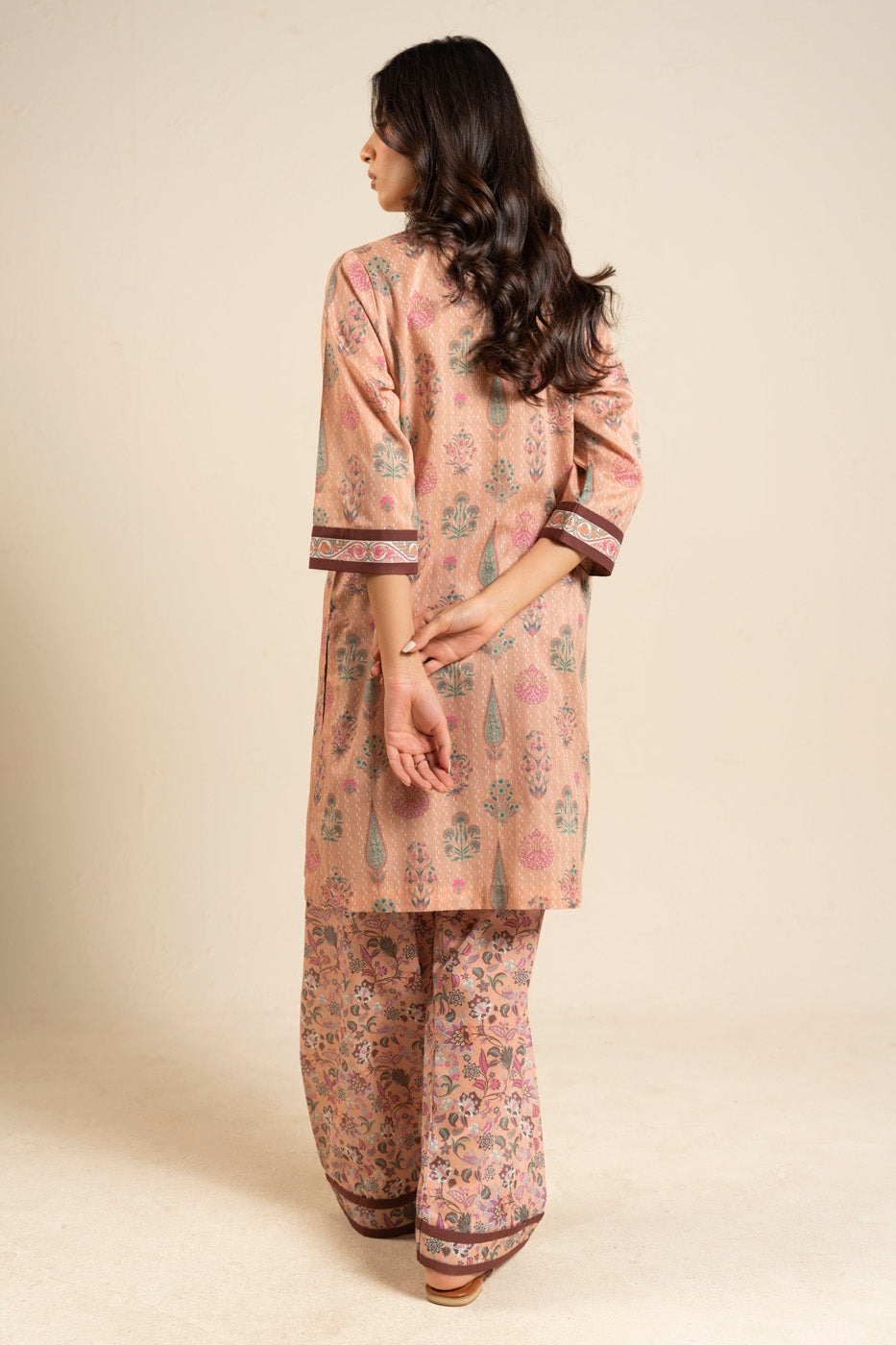 Women's peach floral shirt and wide-leg trouser set with mandarin collar
