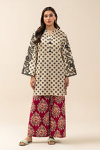 Women's cream and red two-piece printed suit with embroidered tunic and wide trousers