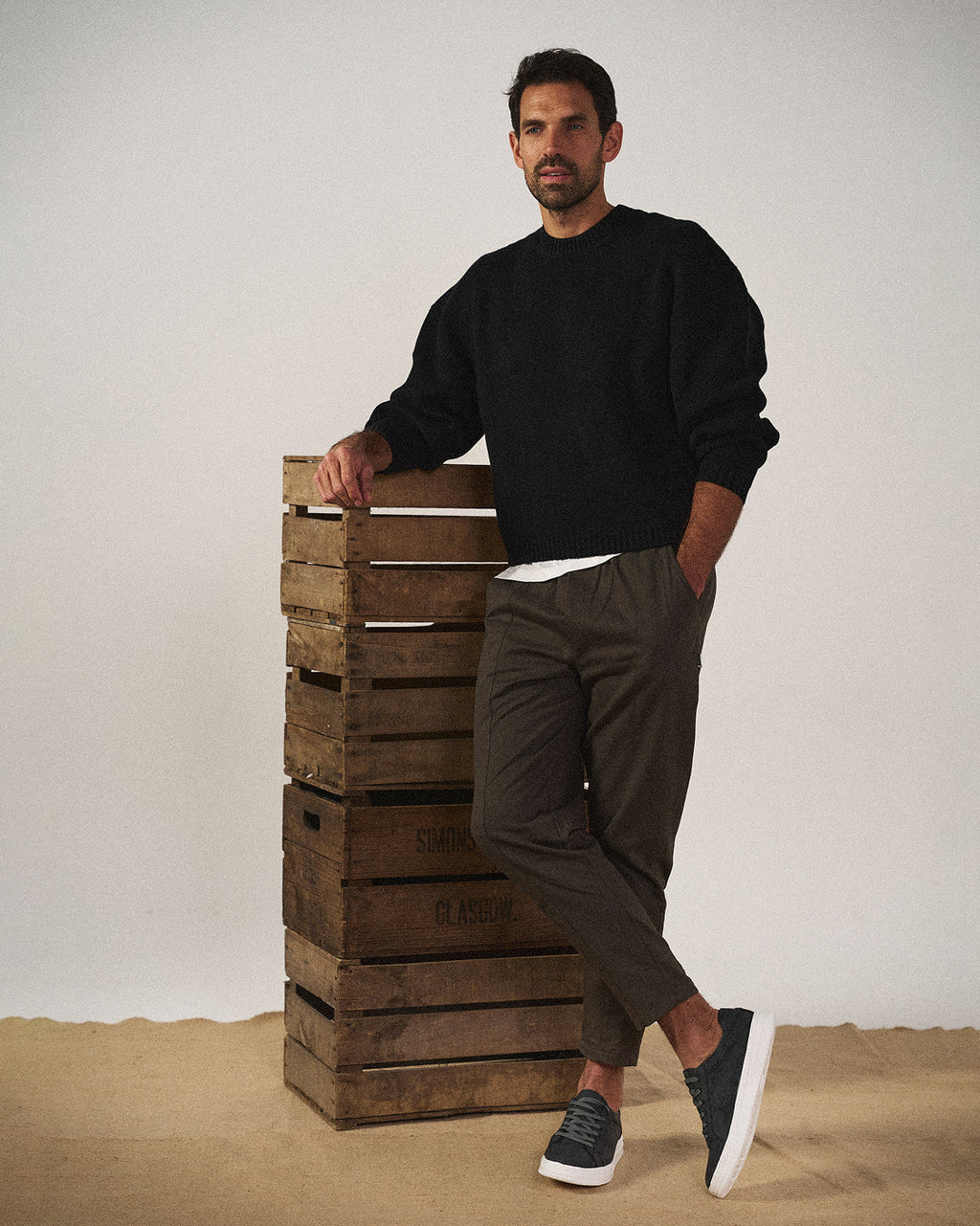 Low-top camouflage trainers with lace-up front and white sole