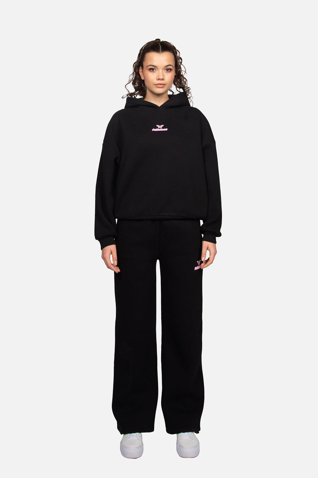 Women's black cropped hoodie with hood and pink chest logo