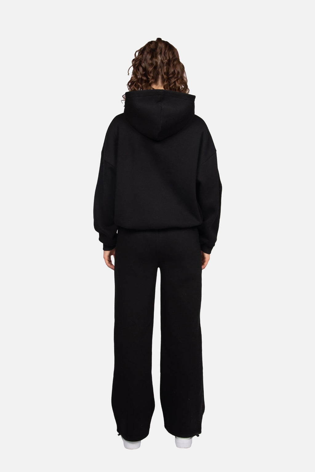 Women's black cropped hoodie with hood and pink chest logo