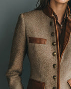 Women's brown herringbone jacket with button front, raised collar and four flap pockets