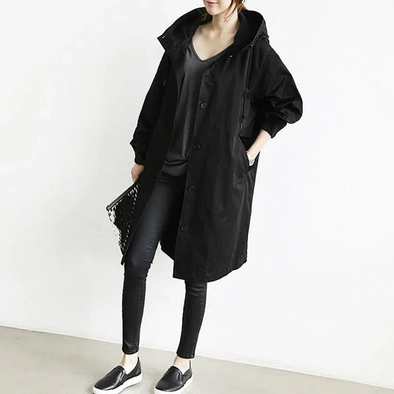 Women's long hooded trench coat with button front and large pockets
