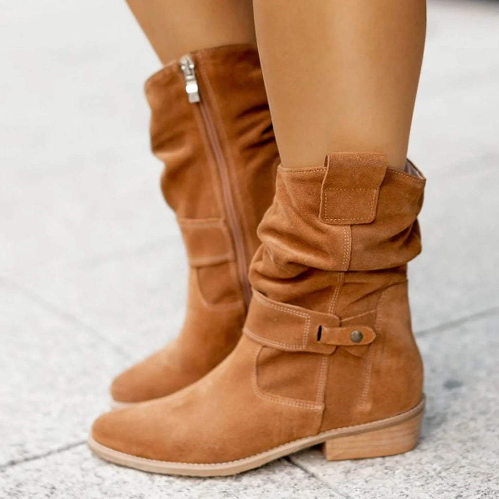 Women's slouch ankle boots with pointed toes, low heels and stitched strap detailing