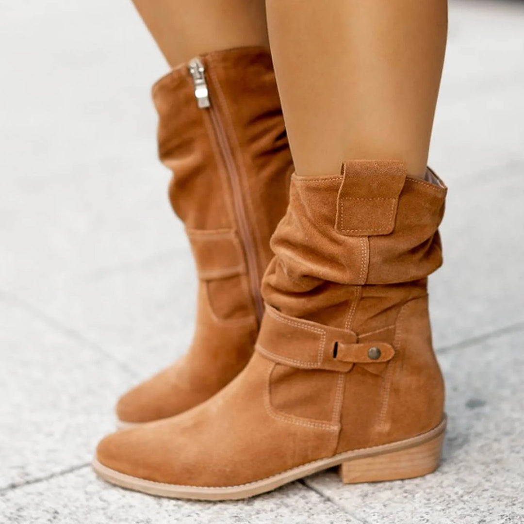 Women's slouch ankle boots with pointed toes, low heels and stitched strap detailing