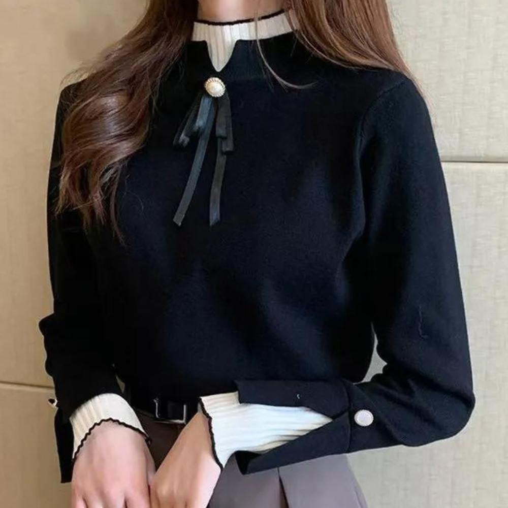 Women's long-sleeved mock neck jumper with pearl button and ribbon bow detail