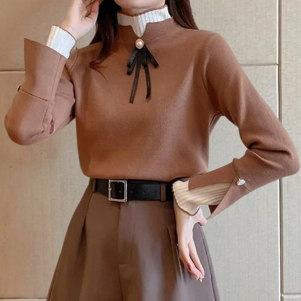 Women's long-sleeved mock neck jumper with pearl button and ribbon bow detail