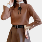 Women's long-sleeved mock neck jumper with pearl button and ribbon bow detail