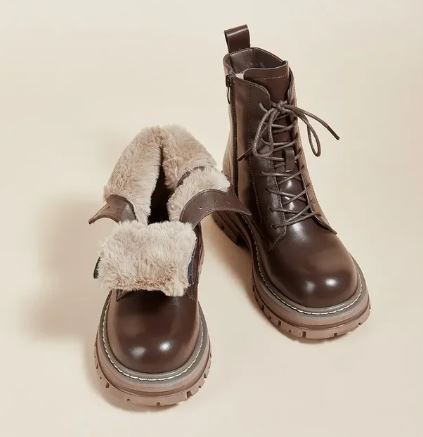 Women's lace-up ankle boots with plush fur trim and chunky lug soles