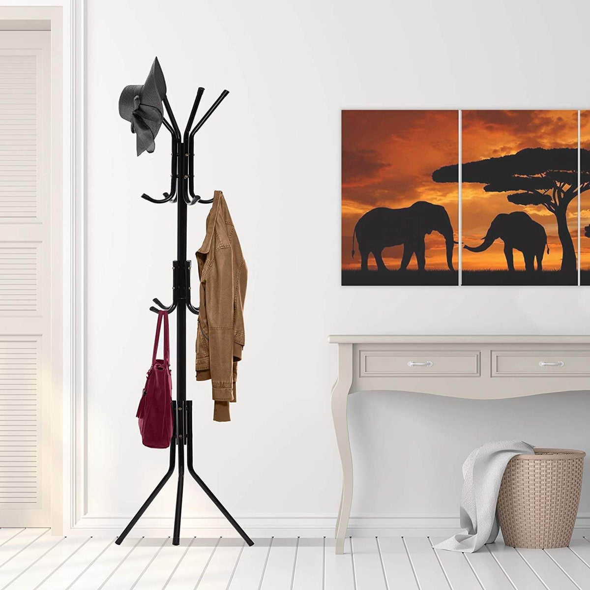 Black freestanding coat rack stand with multiple curved hooks and three-legged base