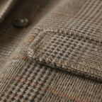 Women's checked trench coat with notch lapels, button front and patch pockets