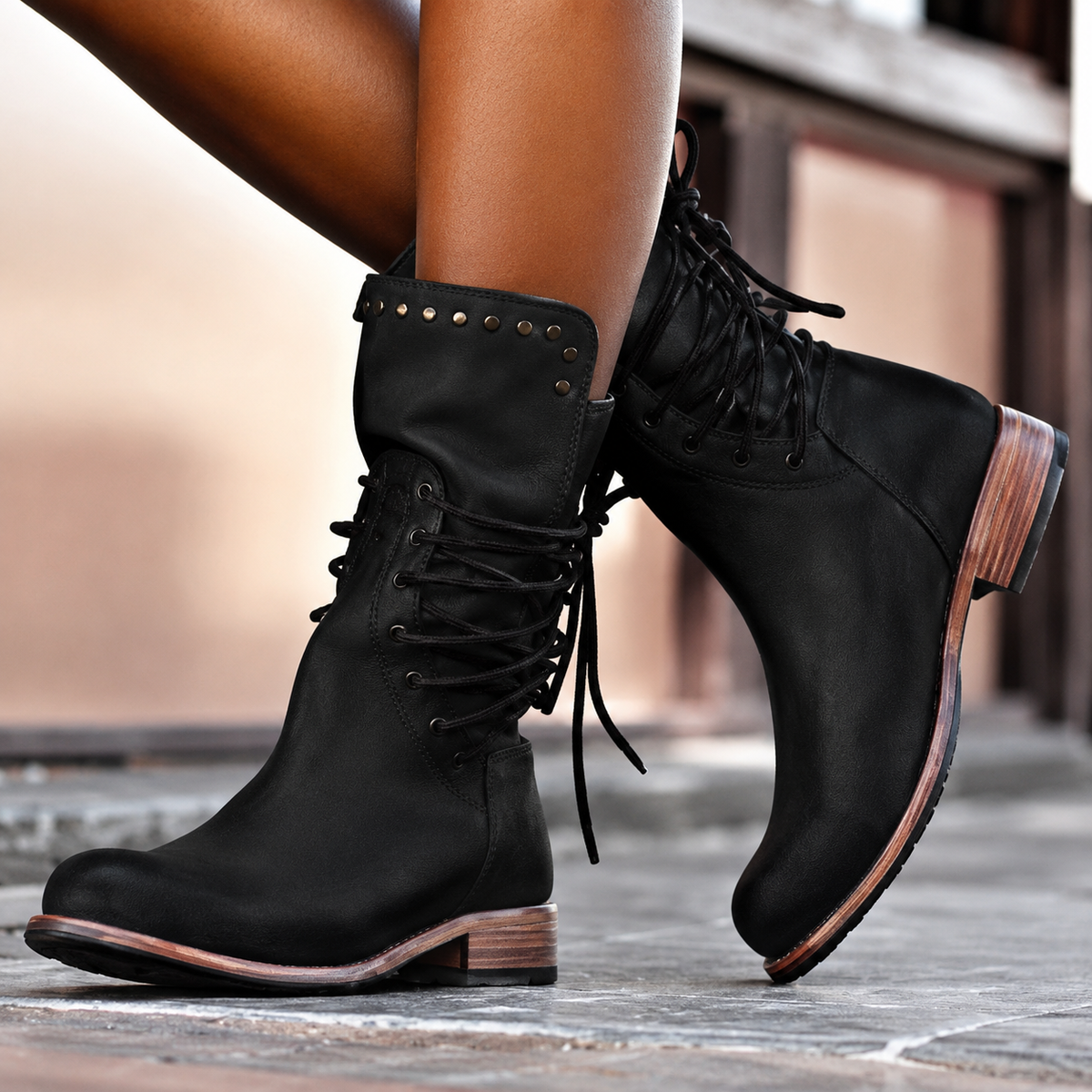 Women's lace-up ankle boots with studded cuffs, low heels and robust soles