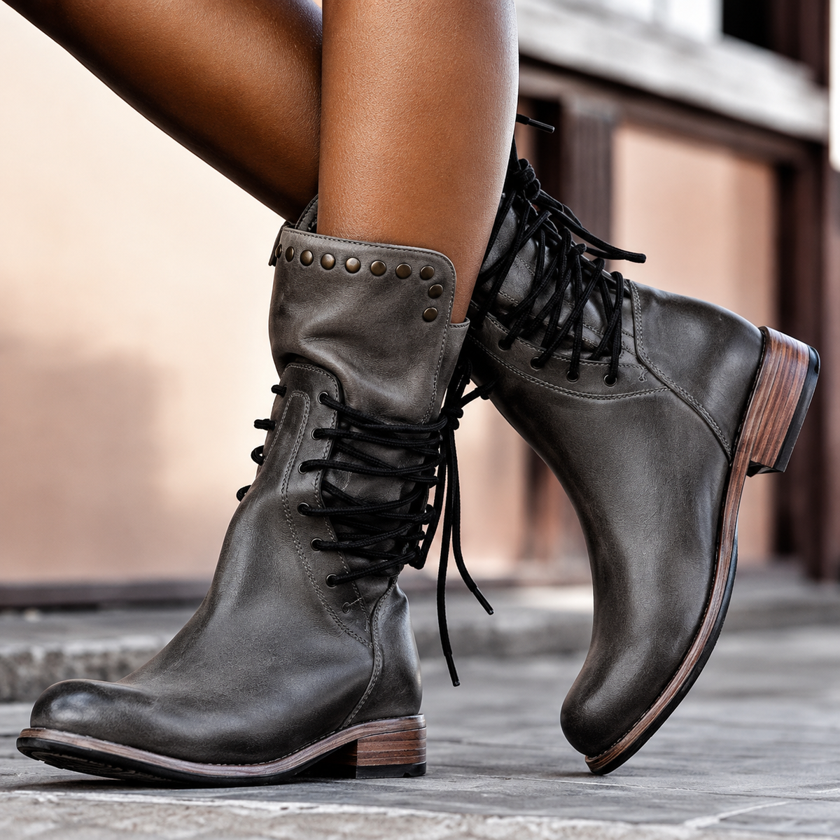 Women's lace-up ankle boots with studded cuffs, low heels and robust soles