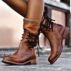 Women's lace-up ankle boots with studded cuffs, low heels and robust soles