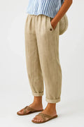 Women's plain cropped trousers with elasticated waist, side pockets and turn-up cuffs