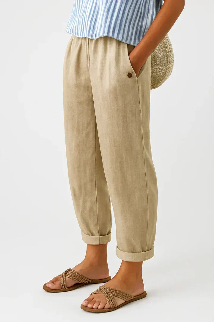 Women's plain cropped trousers with elasticated waist, side pockets and turn-up cuffs