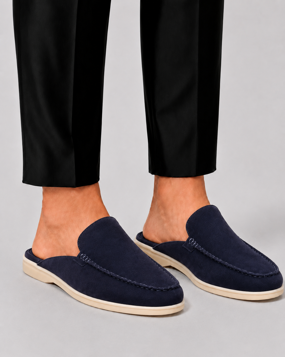 Men's open-heel loafer mules with rounded moc toes and stitched trim