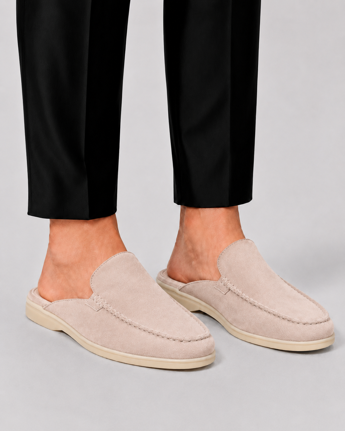 Men's open-heel loafer mules with rounded moc toes and stitched trim