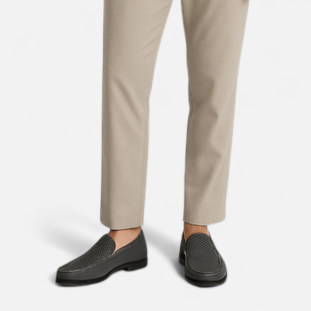 Men's perforated slip-on loafer with moccasin stitching and flat sole