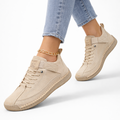 Unisex lace-up sneakers with round toes, flat soles and side strap detail