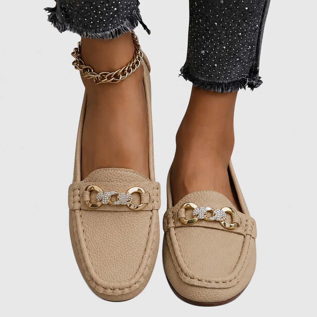 Women's slip-on loafers with rounded toes and decorative chain detail