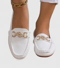 Women's slip-on loafers with rounded toes and decorative chain detail