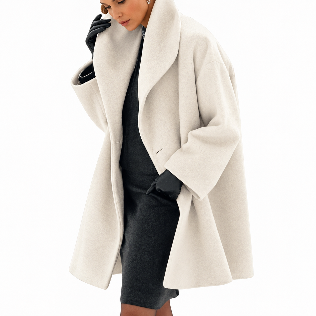 Woman wearing a long-sleeved shawl collar tailored jacket with an open front