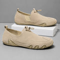 Men's slip-on loafers with moccasin stitching, toggle lace and flat segmented soles