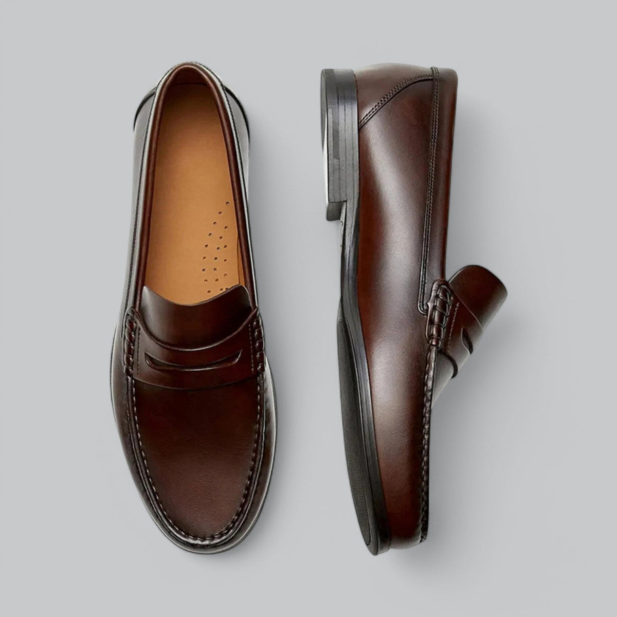 Men's polished penny strap loafers with rounded toes and low heels