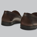 Men's polished penny strap loafers with rounded toes and low heels
