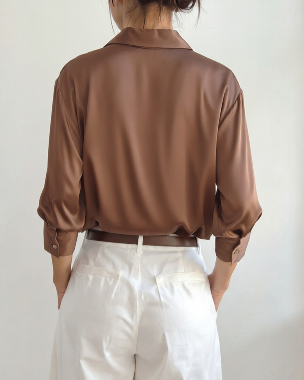 Women's long sleeve collared shirt with button front and wide cuffs