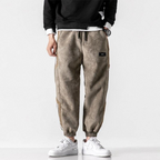 Men's jogger trousers with contrast striped side panels and elasticated ankle cuffs