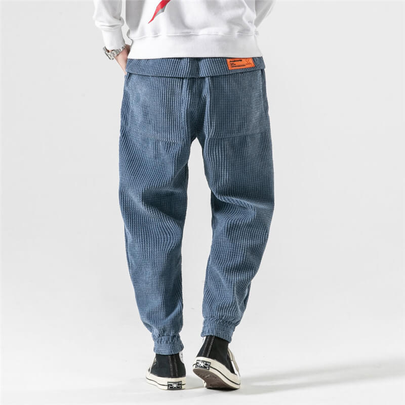 Men's relaxed corduroy jogger trousers with elasticated cuffs and drawstring waist