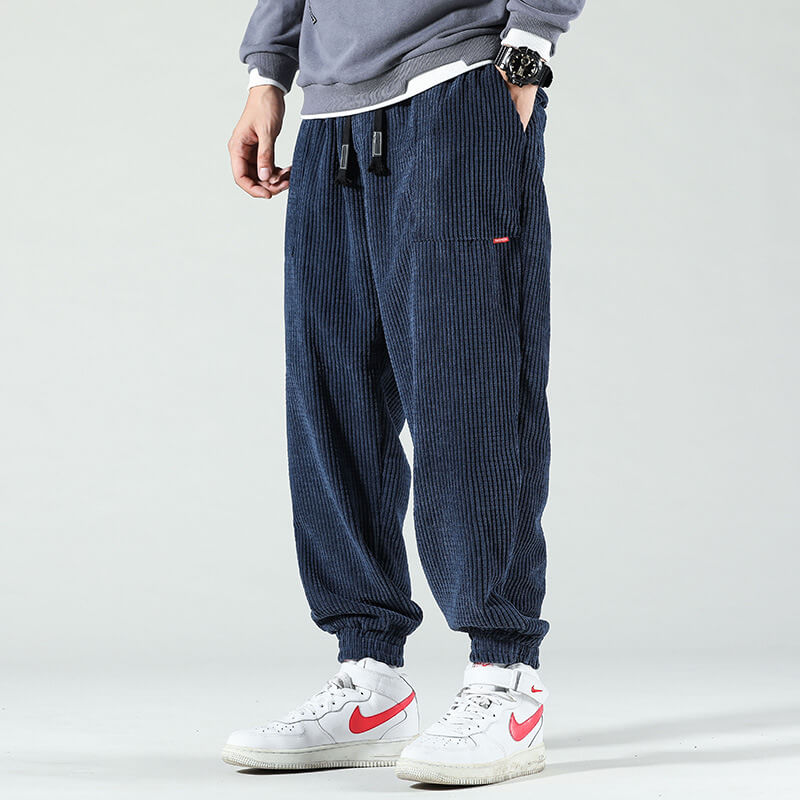 Men's relaxed corduroy jogger trousers with elasticated cuffs and drawstring waist